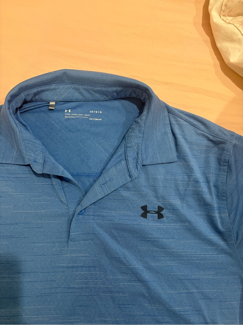Under Armour Men’s Blue Heathered Polo